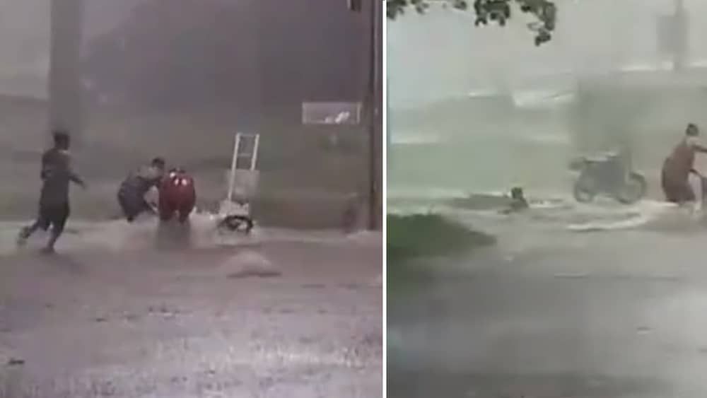 Vídeo: homem tenta segurar moto durante chuva e é levado pela enxurrada em Minas