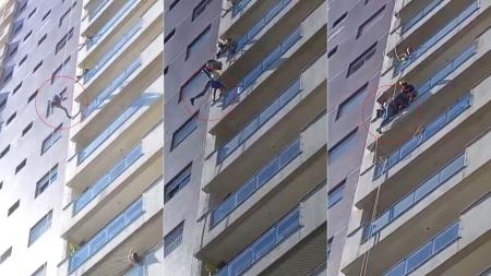 Vídeo: trabalhador sofre mal súbito e fica pendurado durante serviço em prédio de Santos