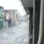 Família de três pessoas é resgatada em carro durante enxurrada em Contagem após forte chuva