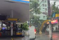 Árvore cai sobre posto de combustível durante temporal em BH e atinge carro