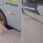 Ônibus fica com roda presa em cratera na região Nordeste de BH; veja vídeo