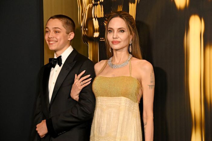 HOLLYWOOD, CALIFORNIA - NOVEMBER 17: (L-R) Knox Jolie-Pitt and Angelina Jolie attend the 2024 Governors Awards at Dolby Theatre on November 17, 2024 in Hollywood, California.   Jon Kopaloff/Getty Images/AFP (Photo by Jon Kopaloff / GETTY IMAGES NORTH AMERICA / Getty Images via AFP)