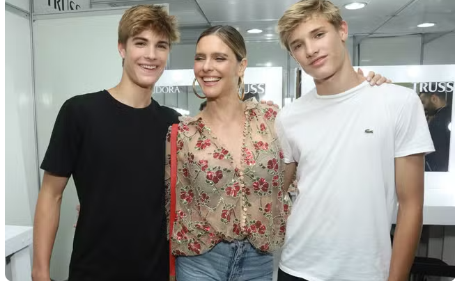 Fernanda Lima e seus filhos gêmeos, João e Francisco, brilham no SPFW