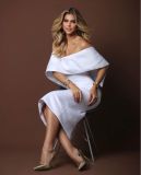 Eduarda Braum com looks da estilista Flávia Murta