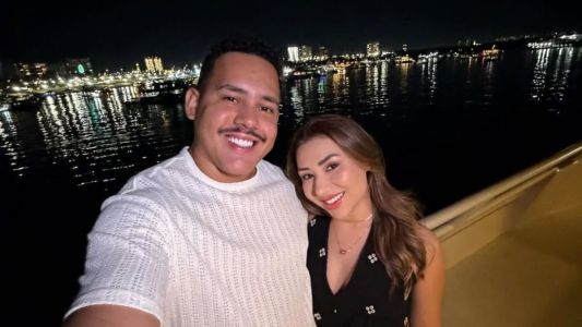 Lucas Buda junto de sua noiva Joyce Magalhães