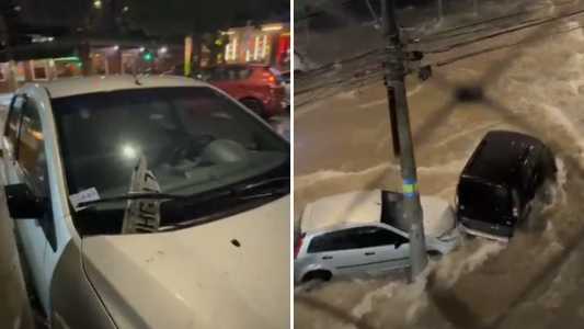 Placa de carro vai parar no retrovisor do veículo após chuva forte atingir Belo Horizonte