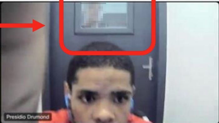 Foto mostra o detento Welbert de Souza Fagundes durante uma audiência de custódia on-line