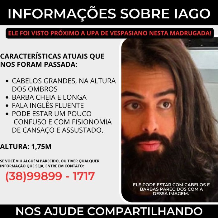 Iago está com cabelos compridos, na altura dos ombros, barba cheia e longa. 