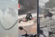 Câmera registra resgate emocionante de motociclista arrastado por enxurrada; veja vídeo