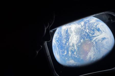 Reid Wiseman contemplando a Terra • Nasa/Redes
