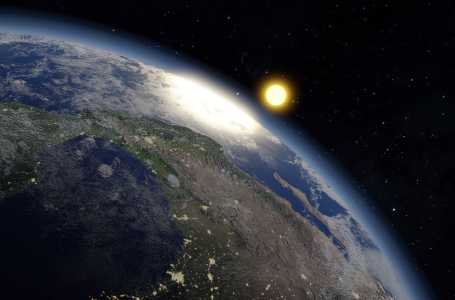 Representação do planeta Terra com vista do Sol ao fundo