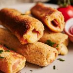 Rolinhos de frango, milho e molho branco: a receita caseira ideal