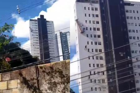 Trabalhadores caem de andaime e ficam pendurados em prédio na Pampulha, em BH