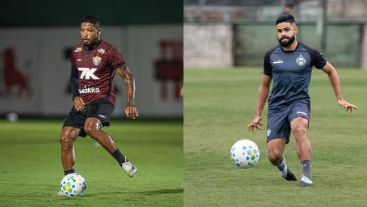 Marinho, do Vitória, e Felipe Jonatan, do Coritiba, durante treino das equipes