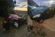Motorista se assusta com morro, perde controle, e carro fica pendurado em BH