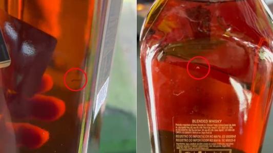 Whisky com suspeita de larvas é encontrado em adega alvo de operação em BH; veja vídeo