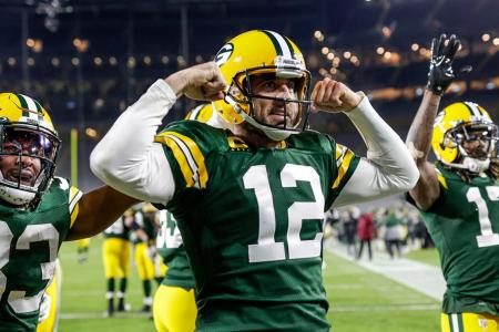 Aaron Rodgers em ação pelos Packers, clube onde atuou por mais de 15 anos