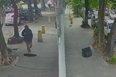 Mulher acaba 'engolida' após cair em bueiro com tampa mal encaixada