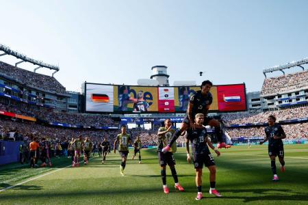 Jogadores do Paragaui comemoram gol sobre a Alemanha na Copa do Mundo de 2026