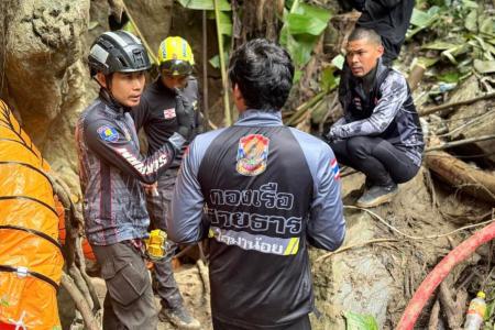 Equipe de resgate trabalhando para encontrar pessoas desaparecidas