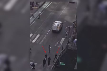 Imagens flagram dois homens atirando • Reprodução / Redes Sociais