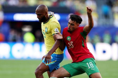 Igor Thiago em ação pelo Brasil contra Marrocos pela Copa do Mundo • Foto por CHARLY TRIBALLEAU / AFP