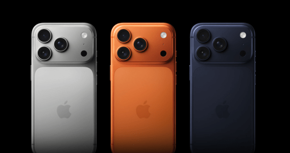 Três iPhones 17, nas cores branco, laranja e preto, em um fundo preto