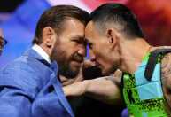 McGregor 'esquenta' encarada com Holloway no UFC e promete: ‘Vou aposentar ele’