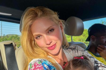 Vini Jr aparece ao fundo de foto de Virgínia