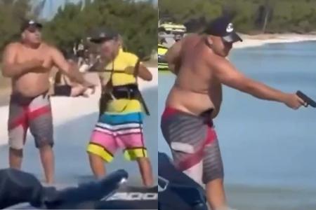 Vídeo banhista aponta arma para velejador, tenta atirar duas vezes, mas disparo falha no RJ
