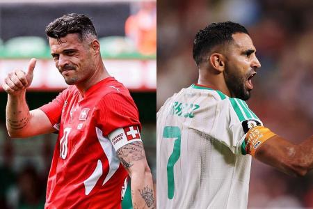 Granit Xhaka (à esquerda) e Mahrez (à direita)