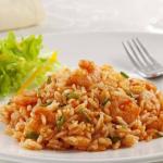 Para comer o arroz de camarão do Tascardoso, primeiro é preciso colocar o babador
