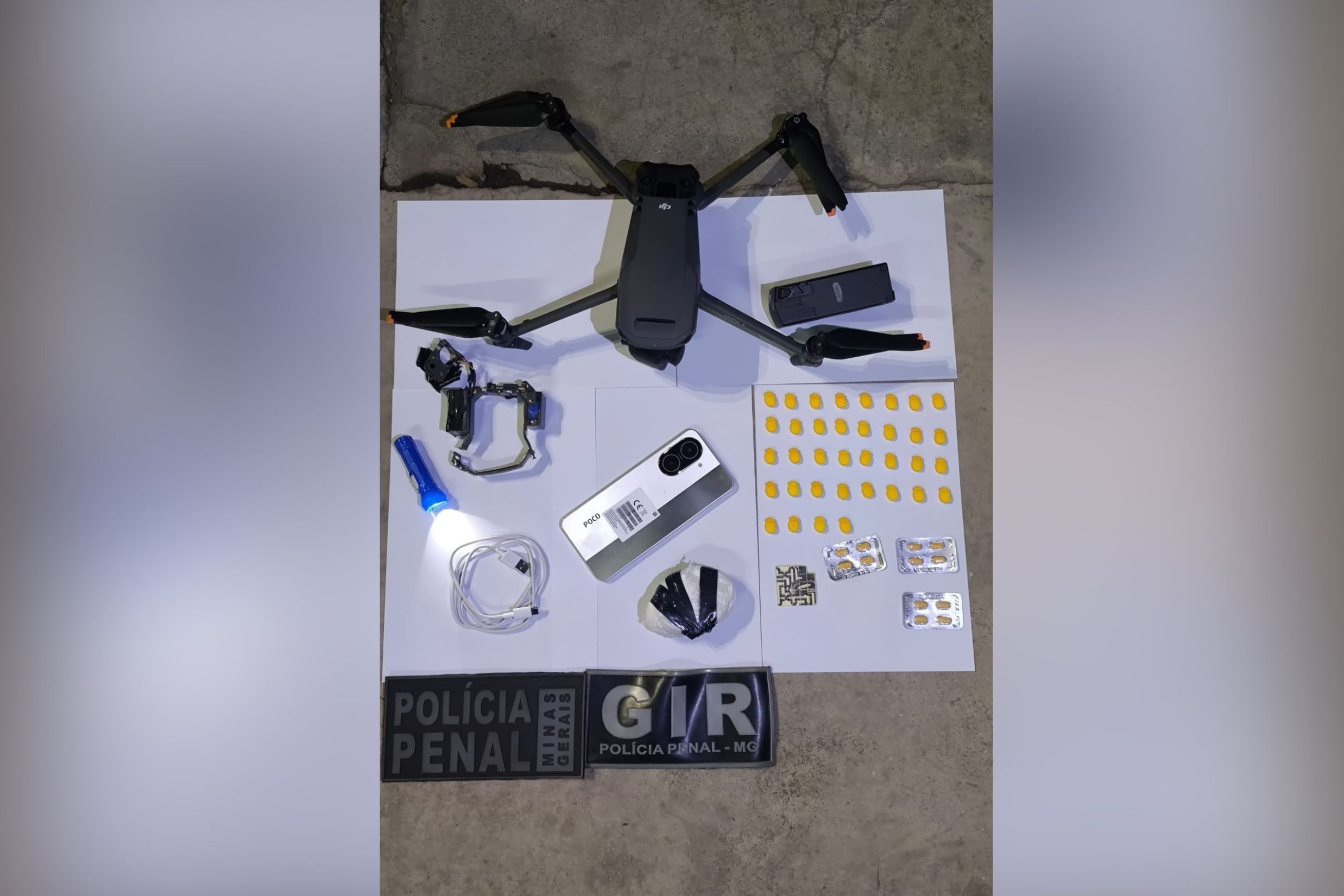 Policiais derrubam drone avaliado em R$ 25 mil que levava droga e celulares para Nelson Hungria