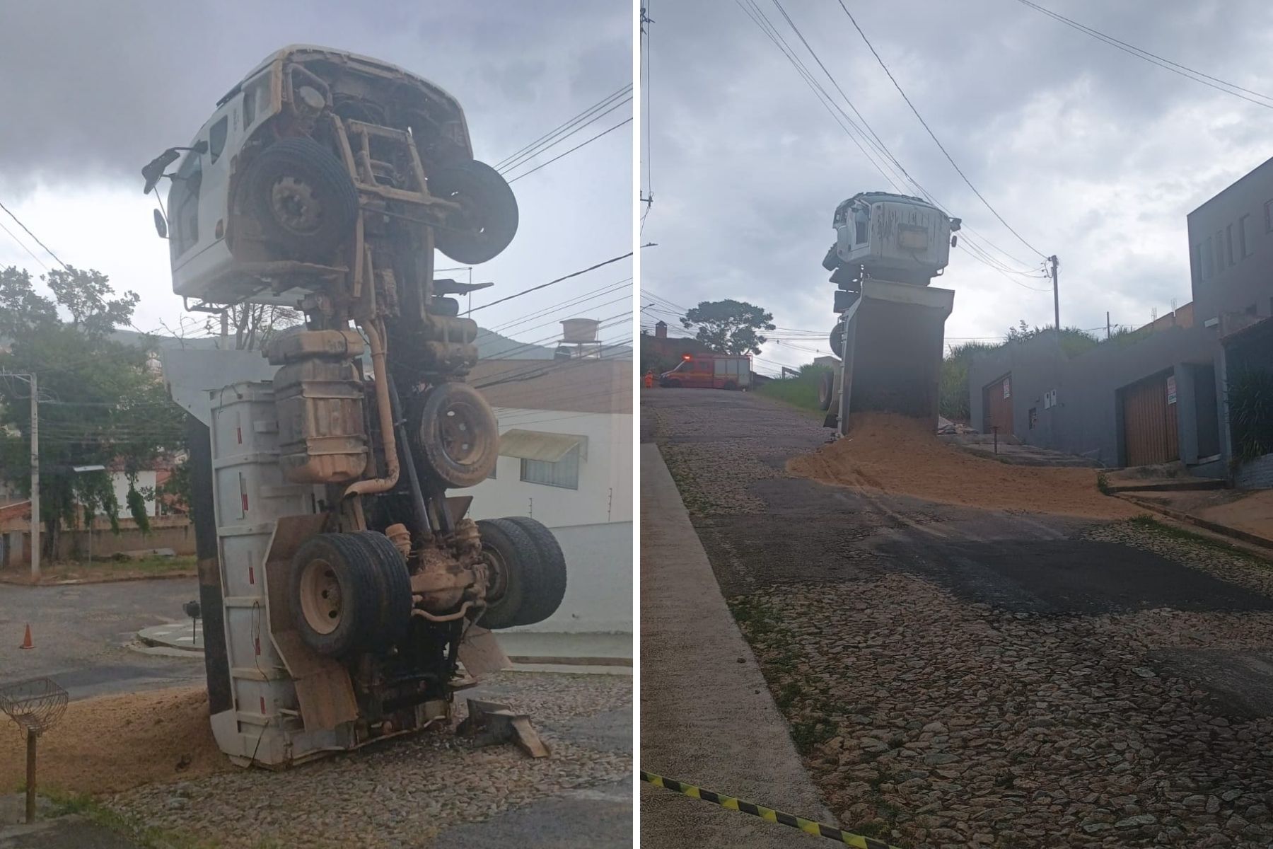 Caminhão carregado de areia tomba, fica ‘em pé’ e deixa motorista preso no alto