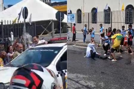 Padre cai ao abençoar viatura da Guarda Municipal em Belo Horizonte