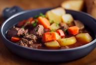 Que tipos de carne, ossos e grão-de-bico devem conter um ensopado tradicional perfeito para ser cheio de sabor?