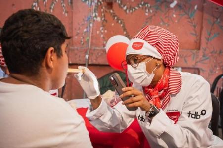 Dentista da Turma do Bem atende paciente odontológico